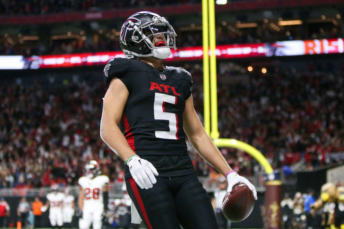 Dec 10, 2023; Atlanta, Georgia, USA; Atlanta Falcons wide receiver Drake London (5) reacts after a two-point conversion against the Tampa Bay Buccaneers in the second half at Mercedes-Benz Stadium.
